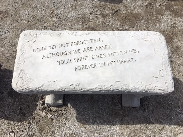 Cement bench with a Memorial message