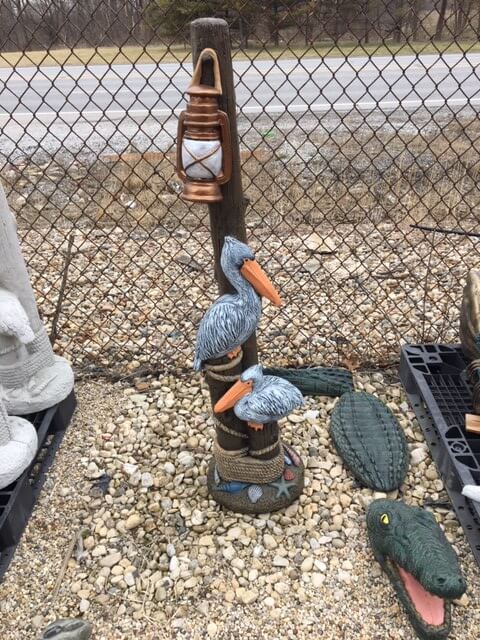 Pelican light post cement garden statue